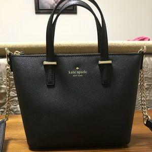 Black Kate Spade bag with handles and straps